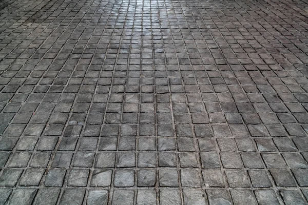 Clean and sealed outdoor pavers maintained throughout the year